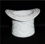 This is a Milk Glass Top Hat. It measures 3 1/4" tall and is 4 1/2" in diameter. Good condition, no chips or nicks.