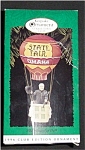 1996 Wizard of Oz State Fair Hallmark Ornament. It is a Collectors Club Edition Ornament. The box does have shelf wear as seen in photos. The ornament is in excellent condition. FREE SHIPPING WITHIN U...