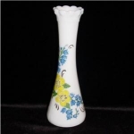 This is Blue and Yellow flower design Milk Glass Bud Vase. It measures 9" tall and in good condition.
