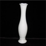 This is a Milk Glass Vine Pattern Bud Vase with scalloped edges. It measures at 10" tall and is in good condition.