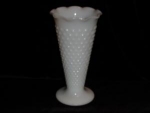 Anchor Hocking Milk Glass Hobmail Vase is 9 1/2" tall. This vase is in good condition, no chips or nicks.