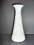 Vintage Milk Glass Stars and Bars Bud Vase made by Anchor Hocking. This vase is 6" tall and some have a star like shape on the bottom. Very good condition.Price is per vase. 