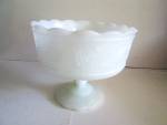 E.O.Brody Milk Glass Pedestal Wide Flower Vase, in a Dot and Swirl Ribbed Design. Vase stands 5.5" tall with a scalloped rim 6.75" wide. Marked on the bottom E.O.Brody M 5000 Cleveland O. US...