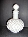 Vintage Fenton Milk Glass Hobnail Stopped Vanity Perfume bottle, made in 1950s and 60s.Very good condition, no chips or cracks. Stands 6.5" tall and 4" wide in middle.