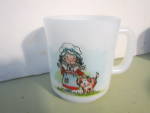 Vintage Collectible Coffee Mug Holly Hobby Like, A Friend is a present you give to yourself. Decorative Coffee Mug, white mug with girl and dog on front. Saying on back. Very nice collectible mug, no ...