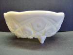 McKee Toltec Milk Glass Footed Bowl. Discontinued pattern footed bowl is 3-1/8in tall. Smooth ruffled 7" opening. Star  pattern bowl has 3 peg feet. #17 on the decorated bottom. Very good conditi...