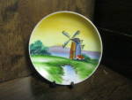Vintage Occupied Japan Windmill Miniture Plate,handpainted,beautiful colors,signed.Hanging holes in the back,Very good condition,price is for one.