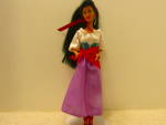 Disney Fashion Doll Walt Disney's Esmeralda black hair, brown eyed doll. Movable head, waist, arms and legs. She is dressed in an original purple skirt, white top dress outfit. She has a red scarf at ...