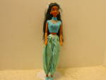 Disney Fashion Doll Walt Disney's Jasmine black hair, brown eyed doll. Movable head, waist, arms and legs. She is dressed in an original blue pants, blue top outfit. She has a blue ribbon in her hair,...