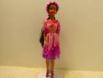Disney Fashion Doll Walt Disney's Costume Jasmine black hair, brown eyed doll. Movable head, waist, arms and legs. She is dressed in an original purple/pink costume outfit. She has a pink/purple ribbo...