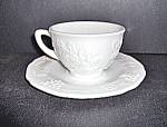 Vintage Milk Glass Grape and Leaf Colony Harvest Cup and Saucer set by Colony. Cup is 6 oz and saucer is 6 in. both in very nice condition. Price is per set.