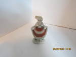 Vintage Occupied Japan Pico Lady Figurine, hand painted white and orange . Good condition, no chips or cracks,price is for one. Marked on bottom.<BR>