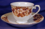 Occupied Japan brown transfer demitasse cup & saucer. Porcelain. Occupied Japan.  c. 1945-1952. Made by Jyoto China. Nice little footed demitasse cup & saucer. A bunch of flowers (laurel?) & foliage i...