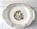 Vintage Limoges American China D'or Handled Platter with picture of Guitarman serenading 2 young women who are obviously (like Today) enthralled! Handles are part of the Design and Platter measures 14...