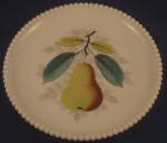 Salad plate with pear decoration in the long-running Westmoreland Pattern #22 (called "Beaded Edge" by collectors). Approximately 7 3/8 inches in diameter. Excellent condition.