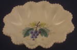 Crimped oval nappy with grape decoration in the long-running Westmoreland Pattern #22 (called "Beaded Edge" by collectors). Approximately 6 1/2 inches in diameter. Excellent condition.