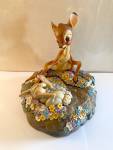 Disney Bambi & Thumper 60th Year Markita Figurine w/ Hidden Compartment & Pin<BR>Sitting on a rock, Bambi, and Thumper frolic in the flowers as they celebrate 60 years in this retired Disney Markita f...