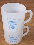 Set of two stable coffee mugs from Federal Glass. They were made for the Farmers Union. They<BR>are stackable and in excellent condition. They stand 3 1/8" tall by 4 1/4" wide.<BR>