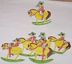 Featured for your enjoyment is a great old set of party favors. These are fold out rocking horses<BR>with their little cowboy rider. The horse has a crepe paper body. 3 are missing a tail and one of<B...