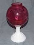 Set on a milk glass pedestal. Made by Fenton in their Coin Dot pattern. Cranberry glass top.  Excellent condition. Stands 8 " tall by 4 " wide.