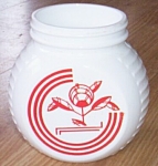 Anchor Hocking 30s milk glass grease jar. Sorry, no lid. Otherwise overall excellent condition.<BR>Bright vibrant red decoration on a stark white background. Stands 5 1/4" tall by 5" wide a...