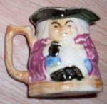 Cute little Toby mug  made in Occupied Japan. It is in excellent condition. Stands 2 " tall by 3 3/8" wide.