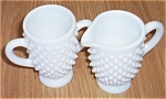 Featured for your enjoyment is this adorable little Fenton Glass cream and sugar set. This is ware<BR>#3901 produced in 1952-1967/68. It is  the older as it is not marked. It is done in the milk glass...