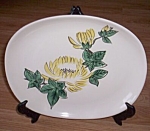 Lovely old platter by Red Wing Pottery. This is in their Concord shape with the Chrysanthemum<BR>or Mum pattern. Made in 1941. It is in excellent condition. There is one tiny scratch on the<BR>surface...