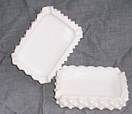 Nice old 40s pair of Fenton ashtrays in their hobnail pattern. Done in a milk glass. Both are in<BR>excellent condition. They stand 1" tall by 4 1/4" long and 3" wide.<BR>