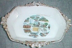 Featured for your enjoyment is an old souvenir dish from Wyoming. It is a milk glass. Sides are<BR>ribbed with a diamond bottom that has 4 dots inside each diamond. The rim is gold trimmed.<BR>Center ...