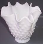 Lovely hobnail vase from Fenton Art Glass. It is done in the milk glass with a ruffled free form top. Pre 1970 as it is not marked. It is in excellent condition and stands 5 " tall by 5 " ...