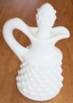 Lovely old Fenton Art Glass oil cruet with original stopper. Done in the milk glass with the hobnail pattern. Excellent condition. Unmarked, pre 1970. Stands 4 3/4" tall.
