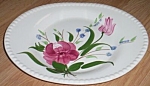 Featured for your enjoyment is a wonderful piece of Blue Ridge Pottery. This is in the<BR>candlewick shape with the Bluebell Bouquet pattern. It is a wonderfully understated pattern of 2<BR>pink flowe...