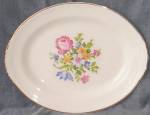 Feature for your enjoyment is an adorable little serving platter from Homer Laughlin. This is in their Nautilus shape with a cross stitch floral pattern. It is also marked by the Cunningham & Pickett ...