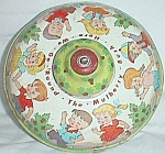 Featured for your enjoyment is an old tin toy top from Ohio Art. This dates between<BR>1959-1962. The famous song we all remember as kids, "Here we go "round the mulberry<BR>bush", is p...