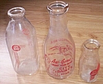 We have a wonderful grouping of old milk bottles here. They are from City Dairy. Not sure what<BR>town or even state, sorry. We have the cream bottle in excellent condition. It stands 5 1/2" tall...