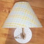 Quilted milk glass wall mounted bed lamp. I dont believe the shade is original and I can leave it<BR>behind if your not interested. Appears to be from the 70s era. Working order.<BR>