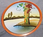 Featured for your enjoyment is another wonderful item from Minnesotas Attic.  This wonderful<BR>old hand painted plate has a lovely serene scene of a tree by the waters edge. It is marked in red,<BR>...