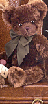 Chocolate is a 16 inch fully jointed beautiful plush bear.  As his name implies, he is a chocolate colored bear with a shaved muzzle and a dark brown stitched nose and mouth.  Chocolate teddy bear has...