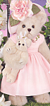 Mother Love and Baby Hugs is a 2 piece set.  14 inch Mother Love is a cream colored dressed teddy bear with dark eyes and a black stitched nose and mouth.  Mother Love bear wears a beautiful pink dres...