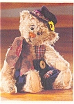 is 8 inches and won the 1999 Golden Teddy Award.  He is a beige bear wearing blue pants with plaid suspenders, a hat and scarf. Chico teddy bear is in new condition directly from the Ganz Company.  Th...
