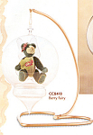 is a 2.5 inch two toned bear with forest green limbs and a light greenish gray body inside a clear ornament.  This bear has a two toned face of the same colors and a light brown stitched nose with whi...