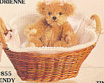 is designed by artist Janice Schmuch.  Wendy teddy is a light brown mohair bear with a black stitched nose and mouth with pink ribbons on her ears.  She comes in a basket lined in white and trimmed wi...