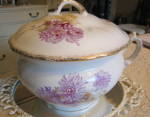 Antique chamber pot with dahlia design. Very lovely and heavy chamber pot. Backstamp dates to 1869-1929. Backstamp: Maddock's Lamberton Works, Royal Porcelain; M over a circle. The company was located...