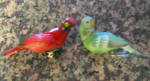 Two vintage ceramic bird cage ornaments. They are very small; have Japan inkstamps on undersides. The green parokeet is very cute. The cardinal has some flaws, but they really are not very noticeable,...