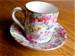Lord Nelson English chintz demitasse cup and saucer. Has a gold backstamp: Lord Nelson Ware, Made in England, 'Marina' on saucer, and also in black stamp: BCM/Nelson Ware, Made in England. No chips or...