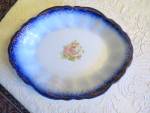 Antique flow blue platter. Age estimate: 1800's. It is marked in green, but I cannot quite make out the mark: it looks like HR crown symbol, Yllie, but not sure, then has the word China and #10 in gol...