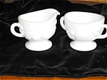 Very nice usable vintage Westmoreland Milk Glass creamer and sugar. c:1940's-1982 mark. Della Robbia pattern. Westmoreland was in business from 1889-1984. The creamer and sugar are in very good condit...