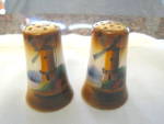 Vintage hand painted Japanese shakers. These feature gold painted tops and a windmill scene. The painting is very nice. They do have some little flaws, mainly around the bottom rim edge. Cork stoppers...