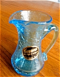 Vintage Kanawha crackle glass miniature pitcher w/label. Very pretty blue crackle glass pitcher with original black & gold label that reads: Kanawha, Hand Crafted Glassware, Dunbar, W. Va. No chips or...